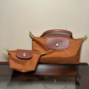 Longchamp mini coin and pouch duo….sold out everywhere